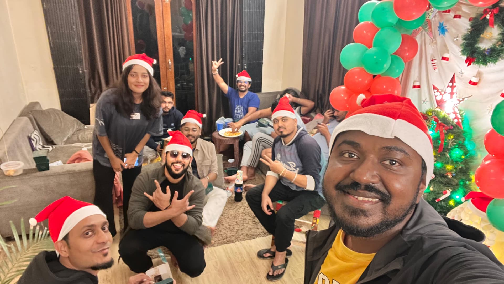 Hostel community Christmas and holiday celebration in the common lounge